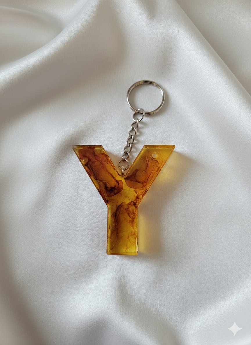 Alpha Key Chains & Hand Bag Accessories - Designer